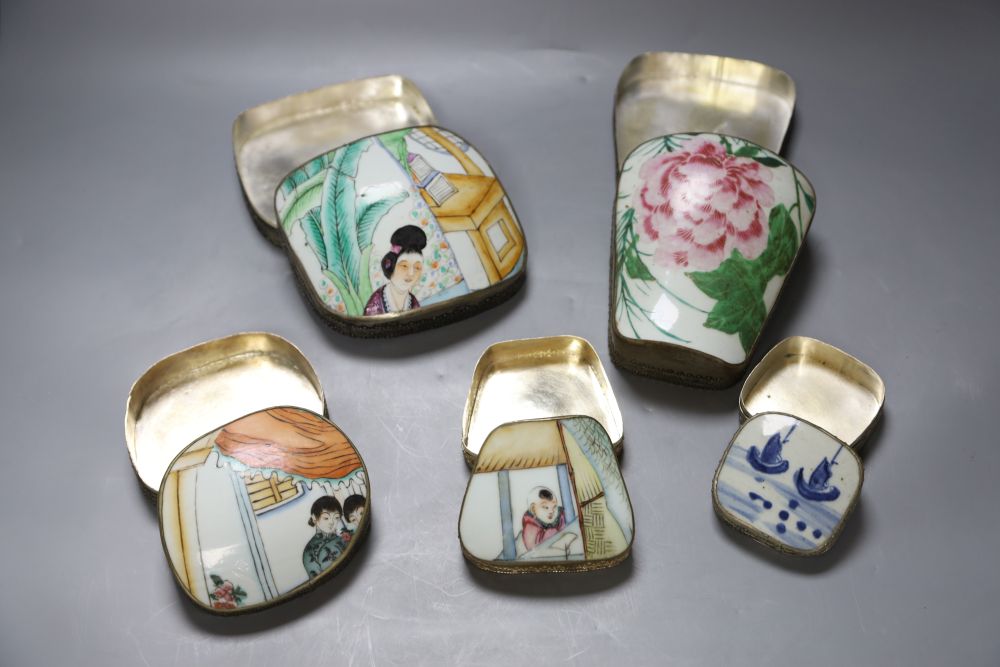 Five Chinese porcelain and metal boxes, each inset with painted porcelain cover, largest 14cm high
